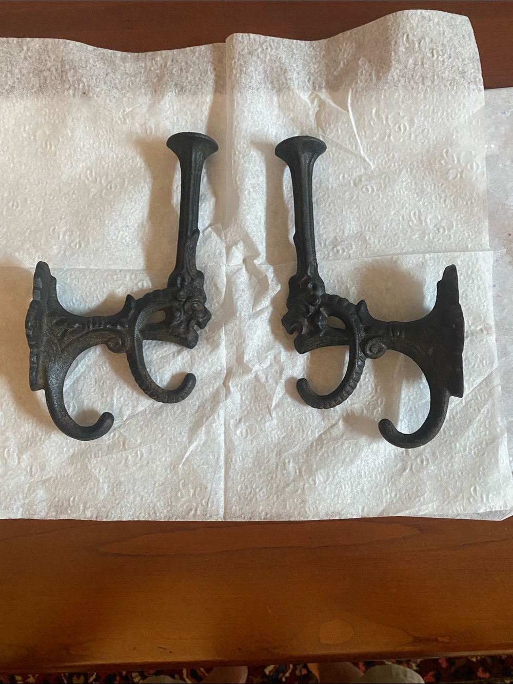 Vintage pair of cast Iron wall hooks. Lion’s head